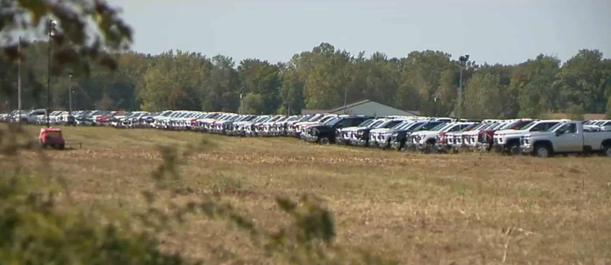 hundreds of unfinished gm trucks parked in an empty field is a chip nightmare 170403 1