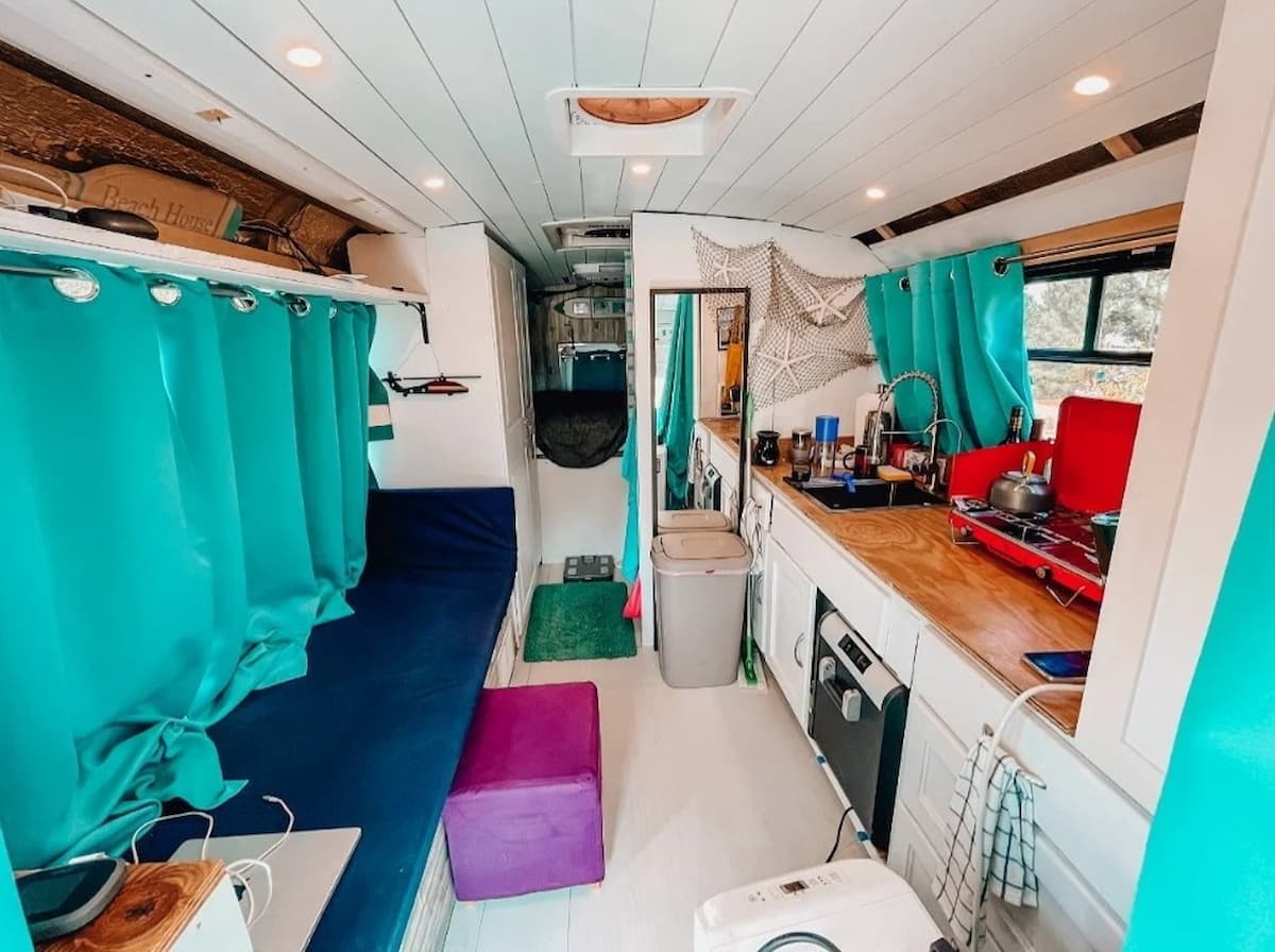this chevy shuttle bus was turned into an off grid beach house on wheels 3