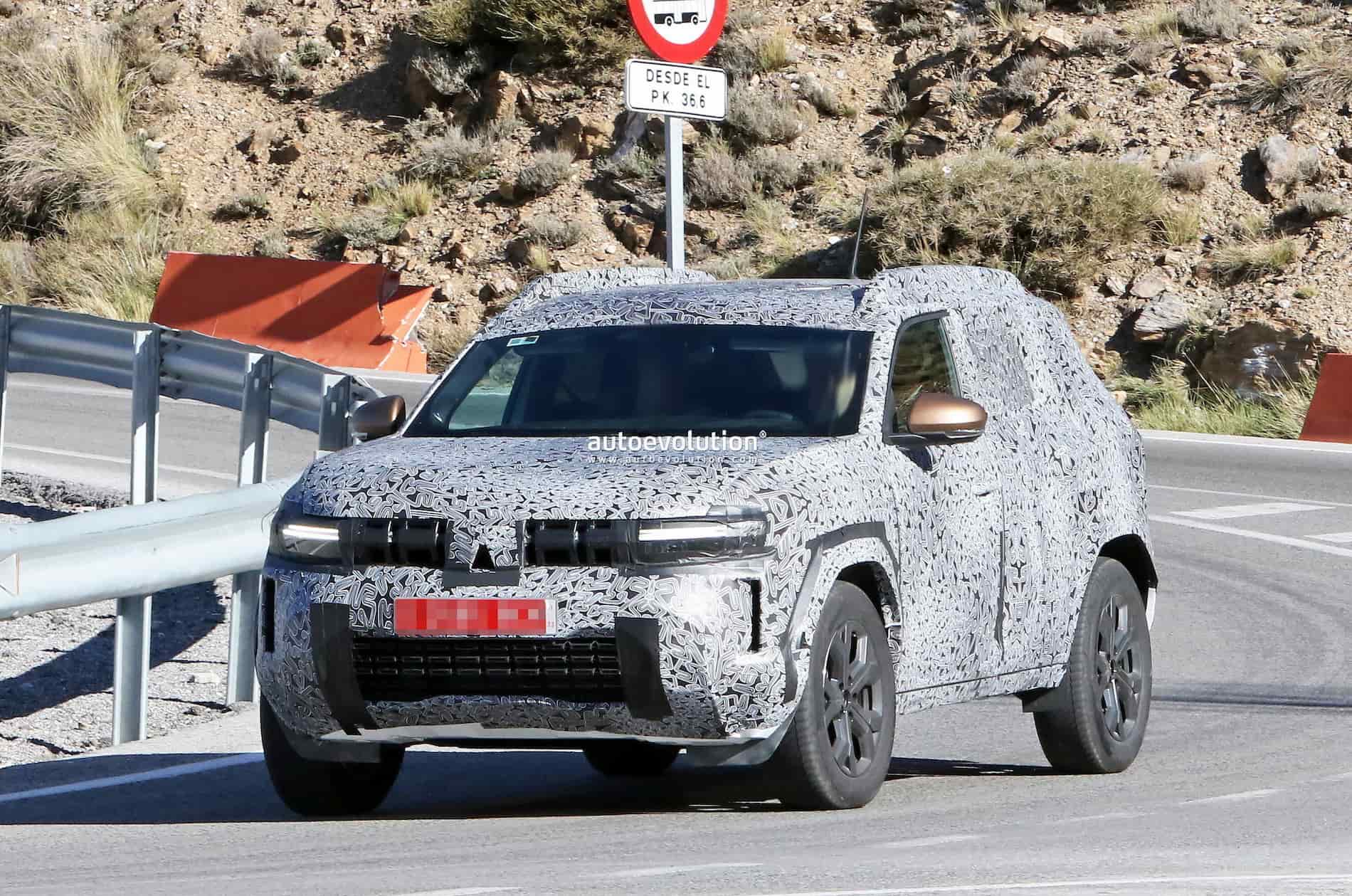 new dacia duster looks bigster in first spy shots 212653 1