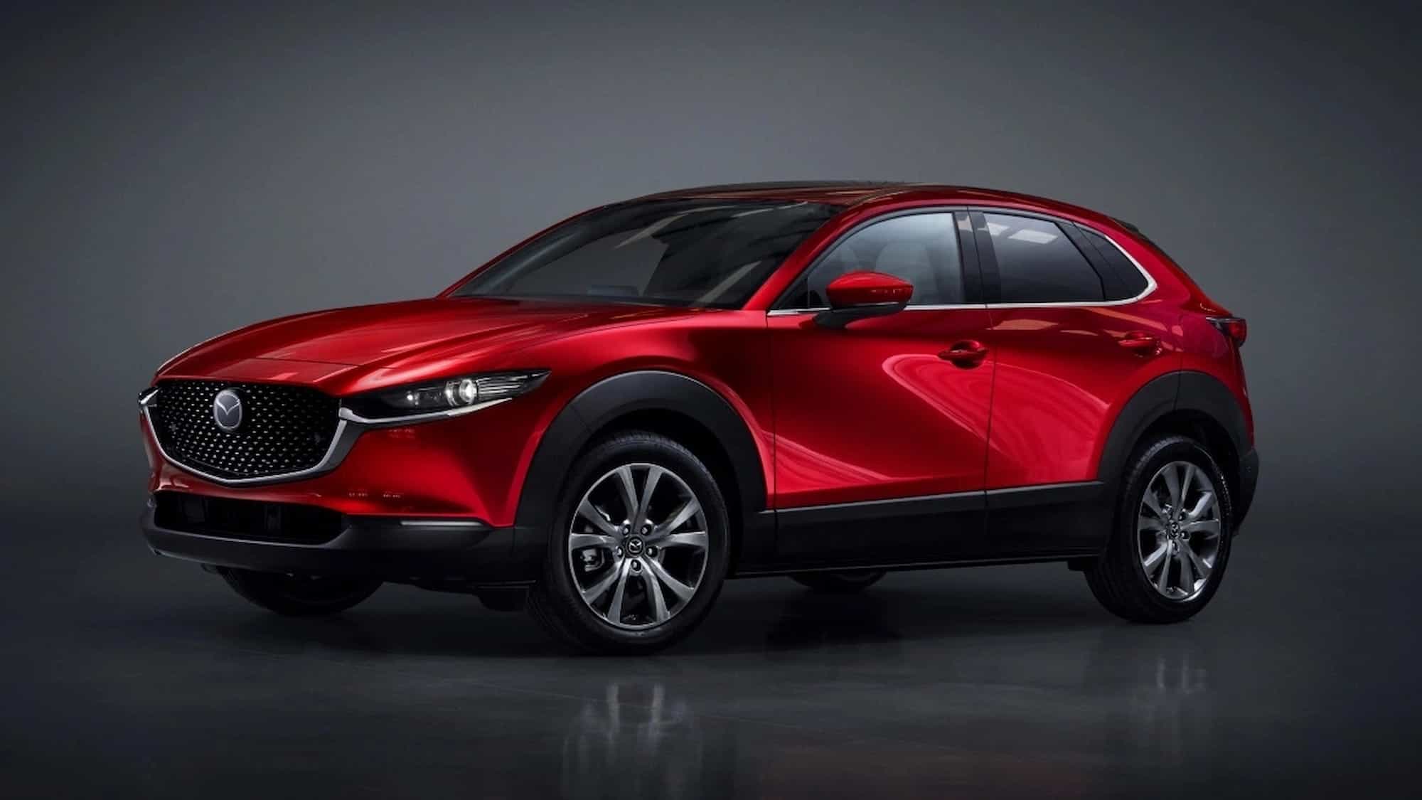 Front angle view of red 2023 Mazda CX 30 cheapest new Mazda SUV and best subcompact