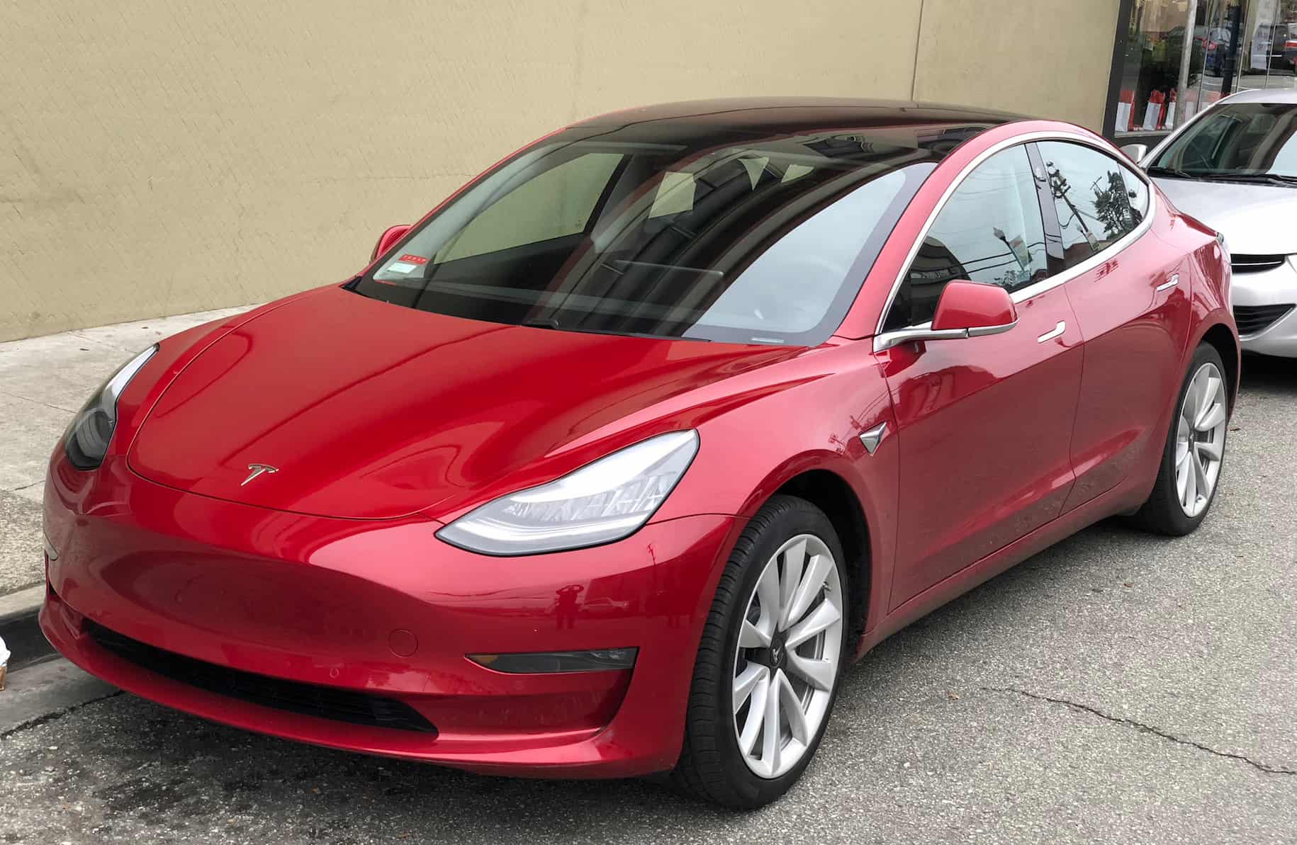 Tesla Model 3 parked front driver side