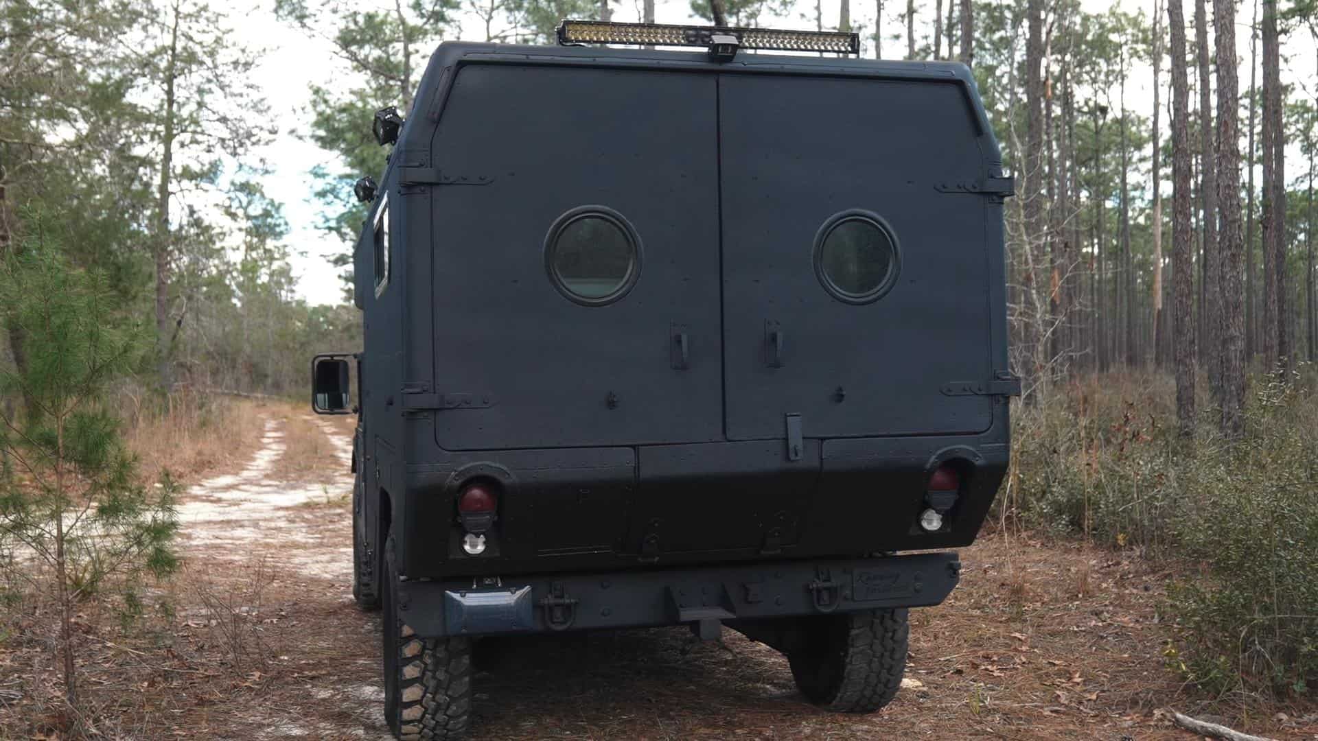 mean looking humvee hides a deluxe and modern tiny home interior it even has a bathroom 11
