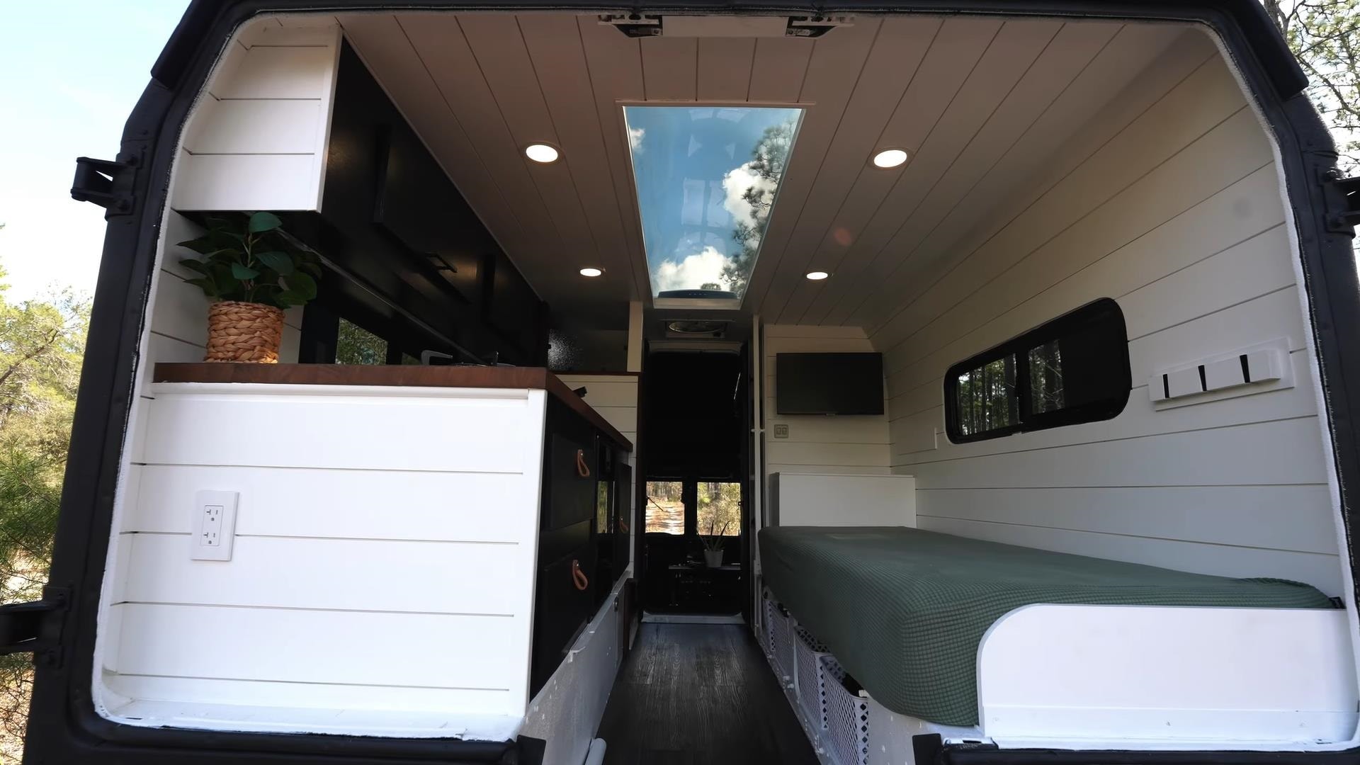 mean looking humvee hides a deluxe and modern tiny home interior it even has a bathroom 16