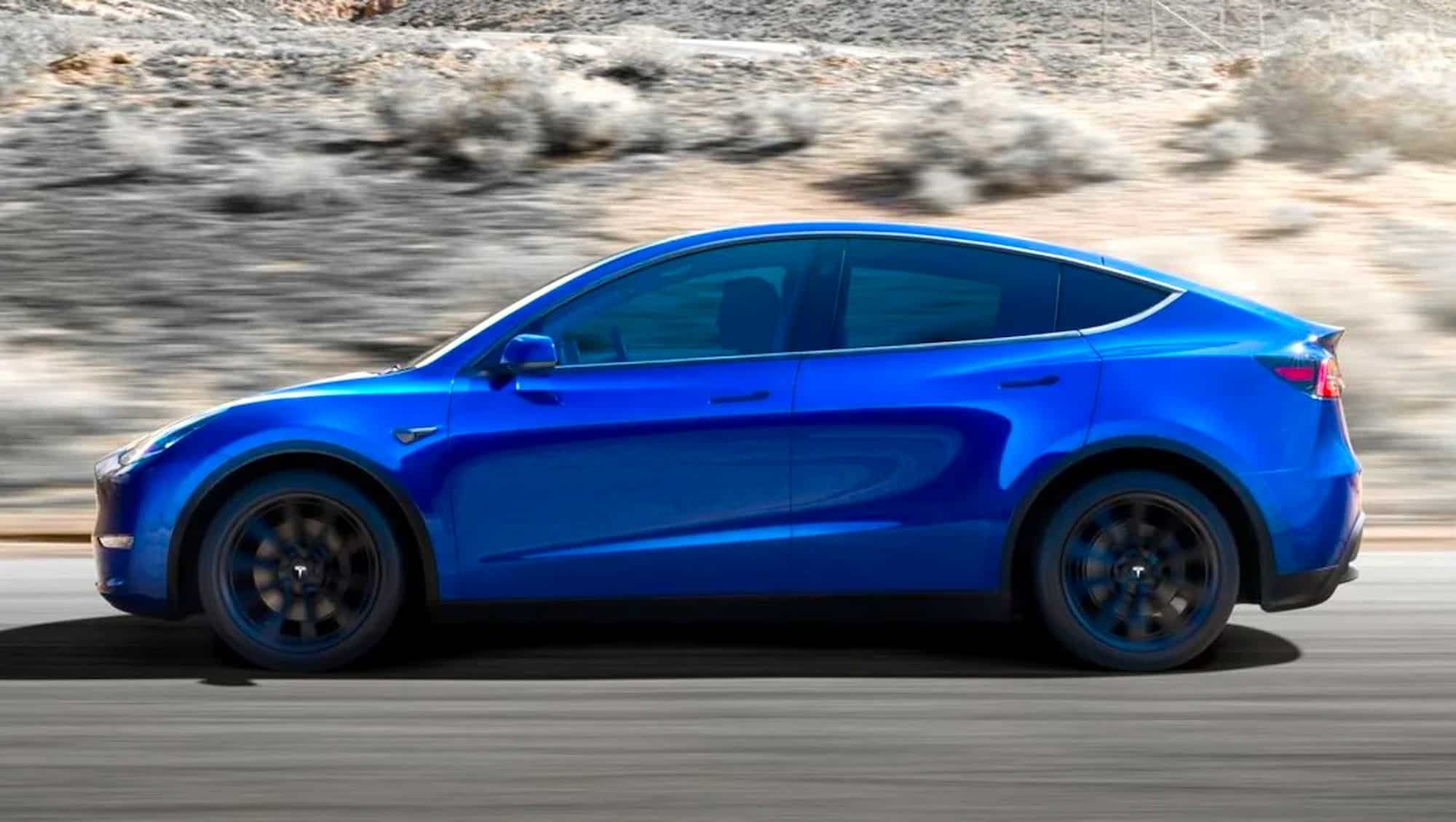 Копия 2022 Tesla Model y blue action side 1001x565 1