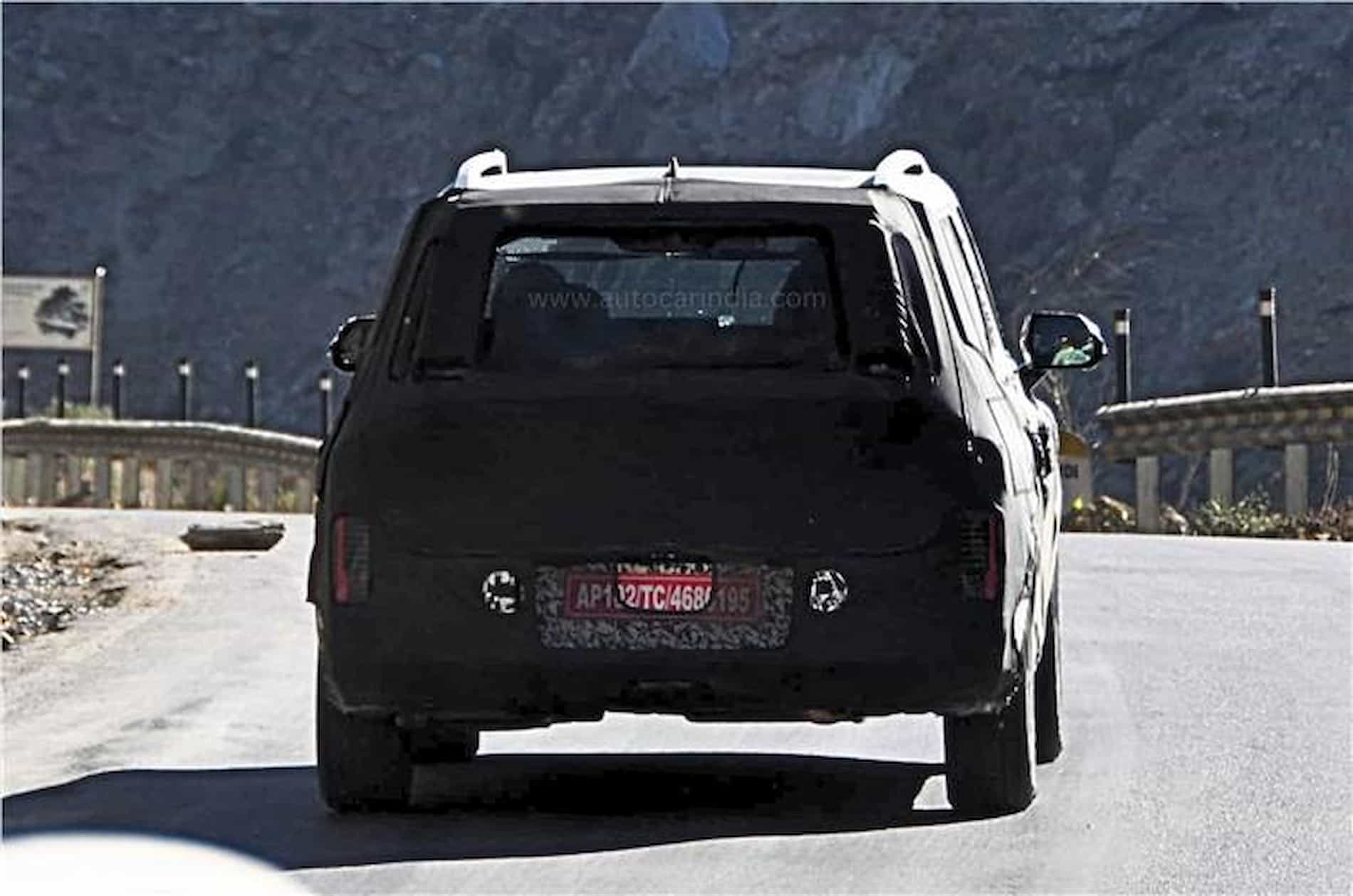 20241029045423 Kia Clavis Syros compact SUV spied rear 1